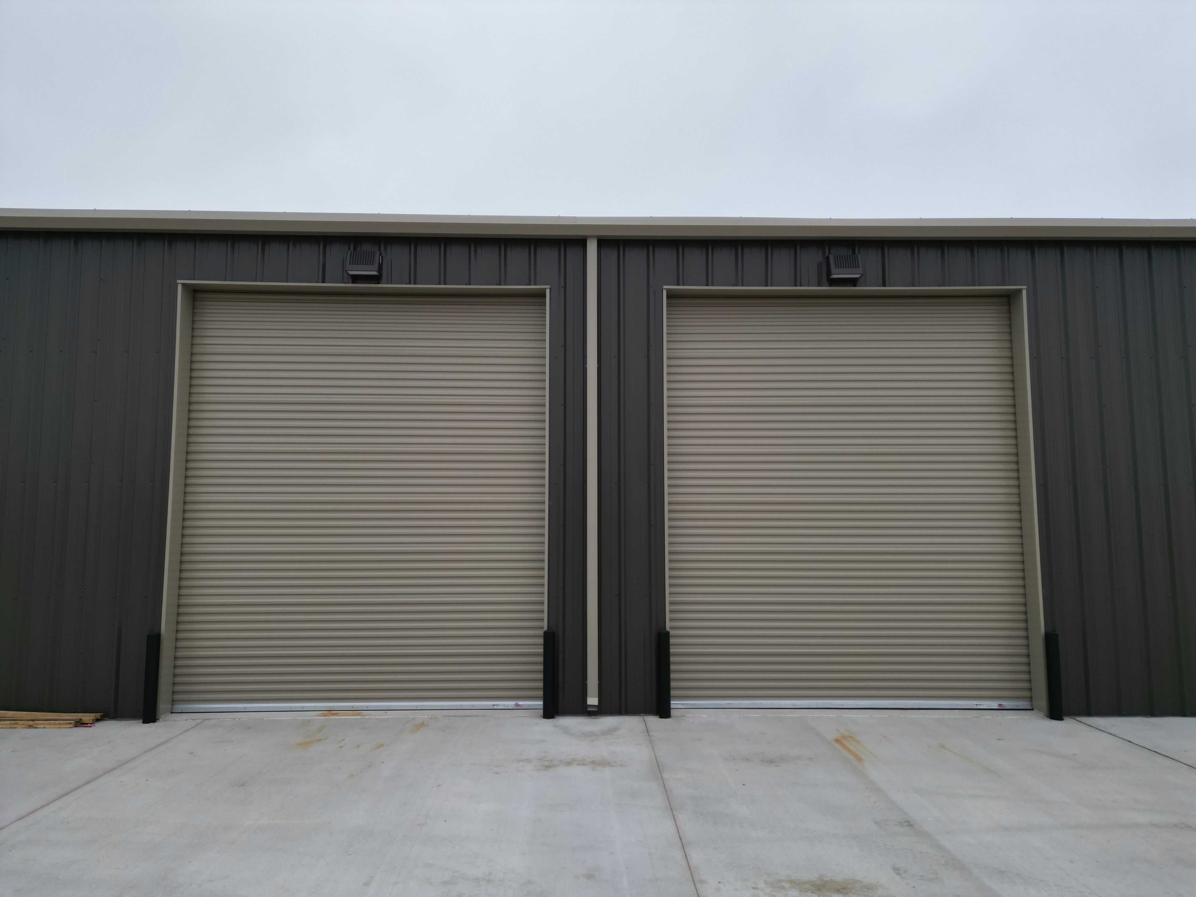 metal building multiple roll up doors bryan tx commercial